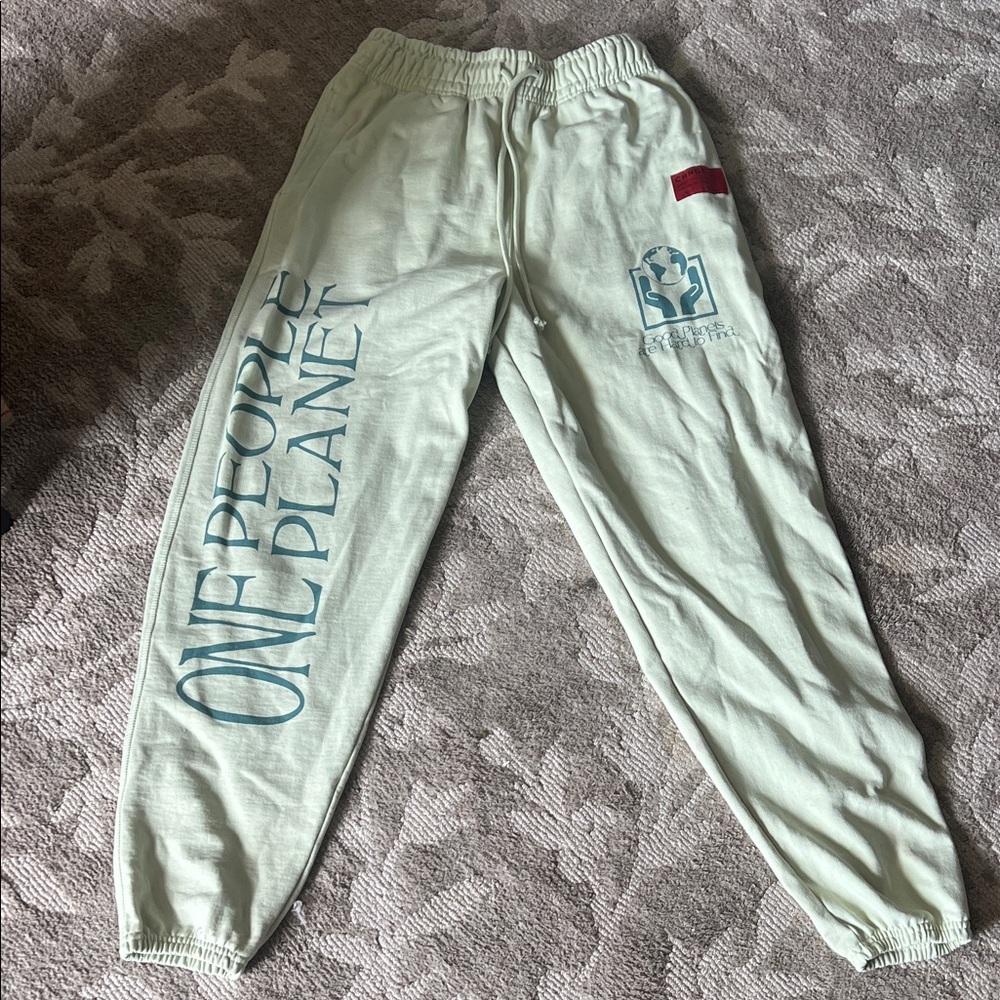 CHNGE Green Fabric with Red Label